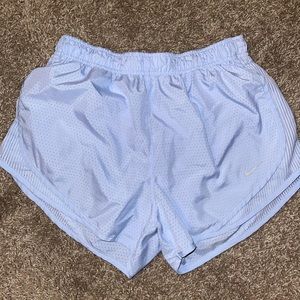 Light blue Nike running shorts